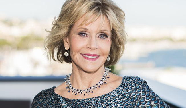 FILE - Actress Jane Fonda appears at the 71st international film festival in Cannes, southern France, on May 12, 2018. The Golden Globes will bestow the Cecil B. DeMille Award to Fonda during the 78th annual awards show next month. (Photo by Arthur Mola/Invision/AP, File)