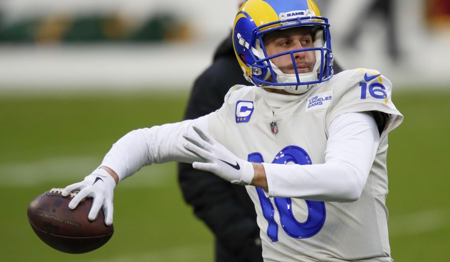 Los Angeles Rams quarterback Jared Goff warms up before an NFL divisional playoff football game against the Green Bay Packers, Saturday, Jan. 16, 2021, in Green Bay, Wis. (AP Photo/Matt Ludtke)