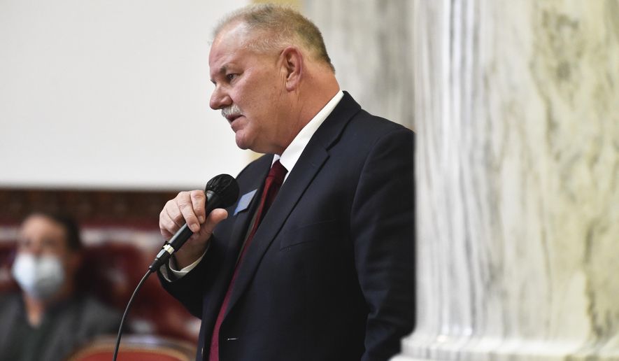 FILE - In this Dec. 7, 2020, file photo, state Rep. Barry Usher, R-Billings, speaks during a meeting of the Joint Rules Committee on the House floor of the Montana State Capitol in Helena, Mont. Montana House Judiciary Committee Republicans cut short the testimony of two opponents of a bill that would ban sanctuary cities in the state during a hearing Tuesday, Jan. 26, 2021, after they said the bill reinforced white supremacist views. Committee Chair Rep. Barry Usher, a Republican from Yellowstone County, said the bill banning sanctuary cities was not related to race, and refused to hear any testimony that mentioned racism. (Thom Bridge/Independent Record via AP, File)