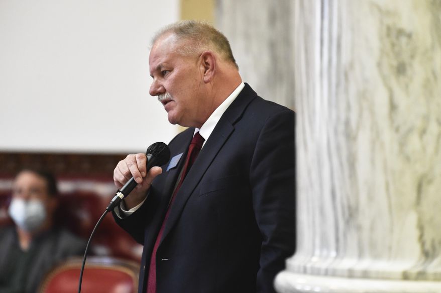 FILE - In this Dec. 7, 2020, file photo, state Rep. Barry Usher, R-Billings, speaks during a meeting of the Joint Rules Committee on the House floor of the Montana State Capitol in Helena, Mont. Montana House Judiciary Committee Republicans cut short the testimony of two opponents of a bill that would ban sanctuary cities in the state during a hearing Tuesday, Jan. 26, 2021, after they said the bill reinforced white supremacist views. Committee Chair Rep. Barry Usher, a Republican from Yellowstone County, said the bill banning sanctuary cities was not related to race, and refused to hear any testimony that mentioned racism. (Thom Bridge/Independent Record via AP, File)