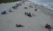 Beachgoers line the sand Thursday, July 9, 2020, in Myrtle Beach, S.C. (AP Photo/Chris Carlson) ** FILE **