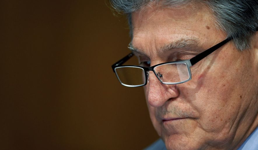 Sen. Joe Manchin, D-W.Va., listens during a confirmation hearing for Secretary of Veterans Affairs nominee Denis McDonough before the Senate Committee on Veterans&#39; Affairs on Capitol Hill, Wednesday, Jan. 27, 2021, in Washington. (Leigh Vogel/Pool via AP) **FILE**