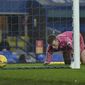 Everton&#x27;s goalkeeper Jordan Pickford fals to same the shot by Leicester&#x27;s Youri Tielemans who scored his side&#x27;s opening goal during the English Premier League match between Everton and Leicester City at the Goodison Park stadium in Liverpool, England, Wednesday, Jan. 27, 2021. (Paul Ellis/Pool via AP)