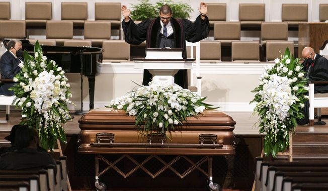 Pastor Richard W. Wills, Sr. prays during the funeral services for Henry &amp;quot;Hank&amp;quot; Aaron, longtime Atlanta Braves player and Hall of Famer, on Wednesday, Jan. 27, 2021 at Friendship Baptist Church in Atlanta. (Kevin D. Liles/Atlanta Braves via AP, Pool)