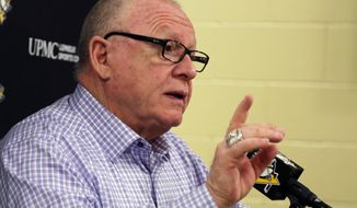 FILE - Pittsburgh Penguins general manager Jim Rutherford has his final meeting of the season with the media at the NHL hockey team&#39;s practice facility in Cranberry, Pa., in this Wednesday, May 9, 2018, file photo. Pittsburgh Penguins general manager Jim Rutherford, a Hall of Famer who helped lead to a pair of Stanley Cup titles, resigned abruptly on Wednesday, Jan. 27, 2021. (AP Photo/Gene J. Puskar, File)