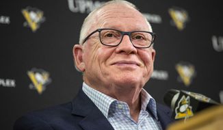 Pittsburgh Penguins general manager Jim Rutherford smiles as he takes questions during a press conference at the UPMC Lemieux Sports Complex in Cranberry, Pa., in this Tuesday, June 25, 2019, photo. Rutherford, a Hockey Hall of Famer who helped lead the team to a pair of Stanley Cup titles, resigned abruptly on Wednesday, Jan. 27, 2021. The 71-year-old cited “personal reasons” in making the decision. (Jessie Wardarski/Pittsburgh Post-Gazette via AP)