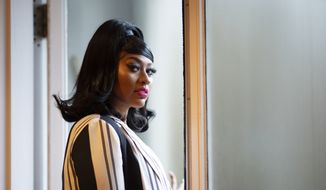 Singer Jazmine Sullivan poses for a portrait in Rydal, Pa., on Tuesday, Jan. 26, 2021 to promote her EP “Heaux Tales.&quot; (AP Photo/Matt Slocum)