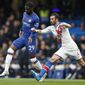 FILE - In this Saturday, Nov. 9, 2019 filer, Crystal Palace&#x27;s Luka Milivojevic, right, challenges Chelsea&#x27;s Fikayo Tomori during their English Premier League soccer match between Chelsea and Crystal Palace at Stamford Bridge stadium in London. Fikayo Tomori was loaned from Chelsea to AC Milan on Friday through the end of the season -- giving the Rossoneri an added option in defense in their bid to win Serie A. (AP Photo/Alastair Grant, File)