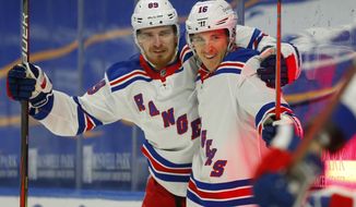 New York Rangers forward Ryan Strome (16) celebrates his goal with forward Pavel Buchnevich (89) during the first period of an NHL hockey game against the Buffalo Sabres, Thursday, Jan. 28, 2021, in Buffalo, N.Y. (AP Photo/Jeffrey T. Barnes)