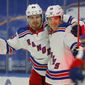 New York Rangers forward Ryan Strome (16) celebrates his goal with forward Pavel Buchnevich (89) during the first period of an NHL hockey game against the Buffalo Sabres, Thursday, Jan. 28, 2021, in Buffalo, N.Y. (AP Photo/Jeffrey T. Barnes)