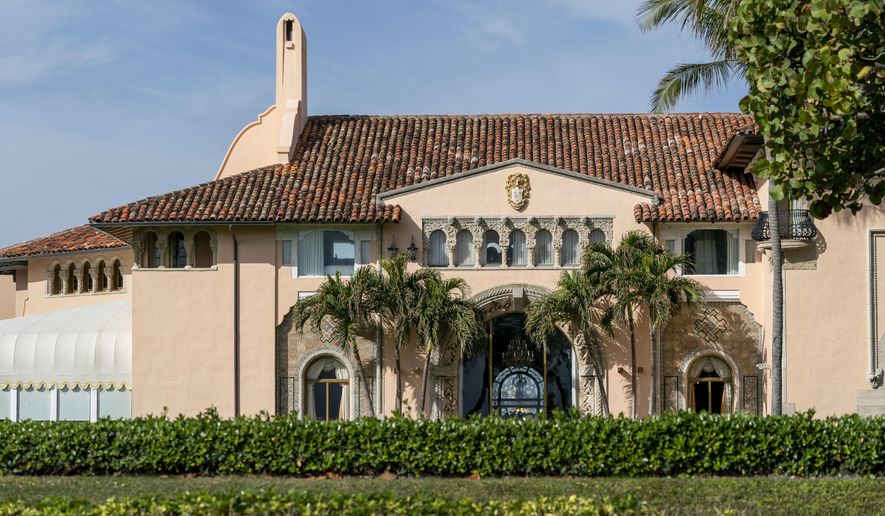 FILE - In this Monday, Jan. 18, 2021, file photo, is Mar-a-Lago in Palm Beach, Fla. Former President Donald Trump has been living at his Mar-a-Lago club since leaving office last week — a possible violation of a 1993 agreement he made with the Town of Palm Beach that limits stays to seven consecutive days. Town Manager Kirk Blouin said in a brief email Thursday, Jan. 28, that Palm Beach is examining its options and the matter might be discussed at the town council&#39;s February meeting.  (Greg Lovett/The Palm Beach Post via AP, File)