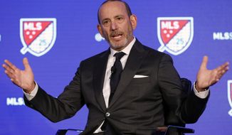 FILE - In this Feb. 26, 2020, file photo, Major League Soccer Commissioner Don Garber speaks during the leagues 25th Season kickoff event in New York. Major League Soccer has extended its deadline for negotiating adjustments to the existing collective bargaining agreement until Feb. 4 and warned it is prepared to lock out players if a deal isn&#39;t reached by then. (AP Photo/Richard Drew, File)