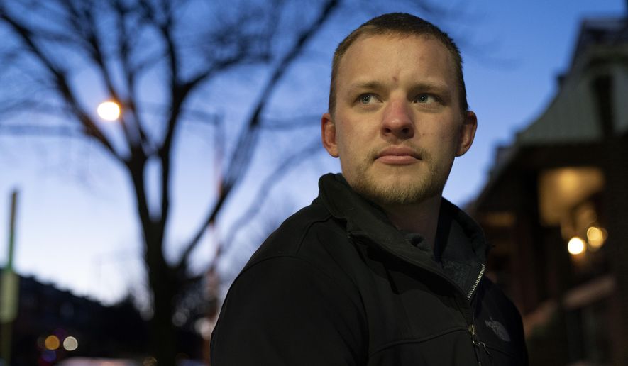 Andrei Doroshin, 22, poses for a portrait, Thursday, Jan. 28, 2021, in Washington. Philadelphia officials have shut down a COVID-19 vaccine clinic after concerns grew about Dorshin, the 22-year-old graduate student running the effort. Drexel University psychology student Andrei Doroshin said he pitched a plan to the city to run the online registry and operate the clinic when he saw no one else doing it. Mayor Jim Kenney said he was concerned by reports they could try to sell patient data and profit from the operation. ( Photo/Jacquelyn Martin)