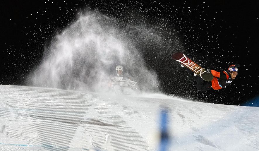 In this photo provided by ESPN, Zeb Powell competes in the final of the Knuckle Huck snowboarding competition at the 2020 Winter X Games in Aspen, Colo. There's only one rule in the event that has captured the imaginations of all the high-flying daredevils at the Winter X Games: Do something cool. This weekend, cool will happen in a contest called Knuckle Huck. (Trevor Brown/ESPN via AP)