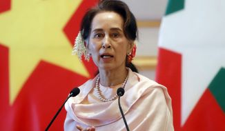 In this Dec. 17, 2019, file photo, Myanmar&#39;s leader Aung San Suu Kyi speaks during a joint press conference with Vietnam&#39;s Prime Minister Nguyen Xuan Phuc after their meeting at the Presidential Palace in Naypyitaw, Myanmar. Reports says Monday, Feb. 1, 2021, a military coup has taken place in Myanmar and Suu Kyi has been detained under house arrest. (AP Photo/Aung Shine Oo, File)
