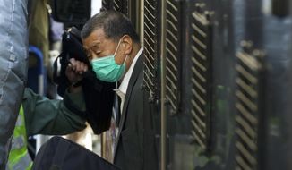 Democracy advocate Jimmy Lai arrives at Hong Kong&#x27;s Court of Final Appeal where the government is arguing against allowing him bail in Hong Kong Monday, Feb. 1, 2021. Lai is charged with &amp;quot;collusion&amp;quot; under the new National Security Law that Beijing imposed on Hong Kong last year. (AP Photo/Vincent Yu)