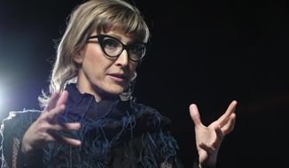Bosnian filmmaker Jasmila Zbanic speaks and gestures during an interview with the Associated Press in the capital Sarajevo, Bosnia, Saturday, Jan. 30, 2021. Zbanic&#39;s latest and the most ambitious film &amp;quot;Quo Vadis, Aida?&amp;quot;, based on true events from Bosnia&#39;s brutal 1992-95 inter-ethnic war has been many years in the making. (AP Photo/Kemal Softic)