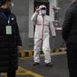 Marion Koopmans of a World Health Organization team arrives at the Hubei Center for Disease Control and Prevention in Wuhan in central China&#39;s Hubei province Monday, Feb. 1, 2021. The WHO mission team investigating the origins of the coronavirus pandemic in Wuhan. (AP Photo/Ng Han Guan)