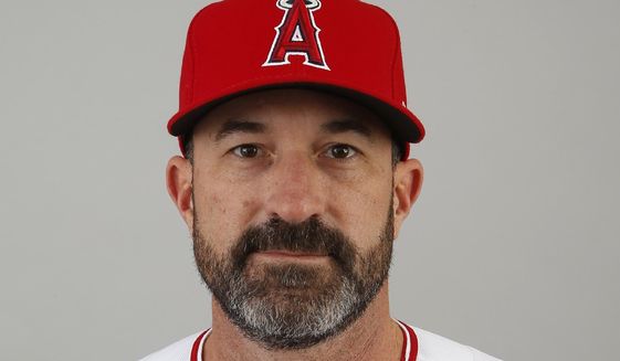 This 2020 file photo shows Los Angeles Angels pitching coach Mickey Callaway. Callaway, former manager of the New York Mets and current Los Angeles Angels pitching coach, “aggressively pursued” several women who work in sports media and sent three of them inappropriate photos, The Athletic reported Monday, Feb. 1, 2021. (AP Photo/Ross D. Franklin, File) **FILE**