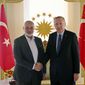 In this Feb. 1, 2020, file photo, Turkey&#39;s President Recep Tayyip Erdogan, right, shakes hands with Hamas movement chief Ismail Haniyeh, prior to their meeting in Istanbul. (Presidential Press Service via AP, Pool, File)