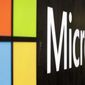 The Microsoft company logo is displayed at their offices in Sydney, Wednesday, Feb. 3, 2021. Microsoft says it supports Australia&#39;s plans to make the biggest digital platforms pay for news and would help small businesses transfer their advertising to Bing if Google quits the country. (AP Photo/Rick Rycroft)