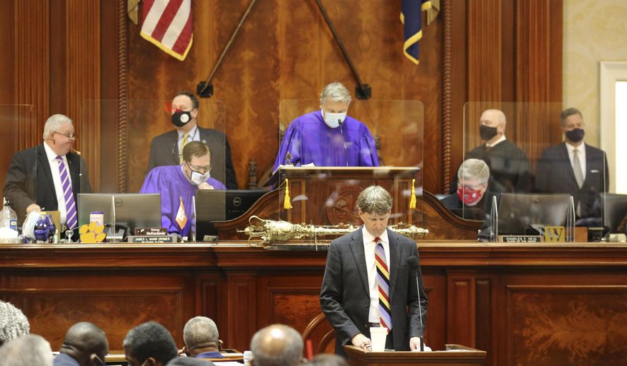 South Carolina Sen. Luke Rankin speaks from the well as House Speaker Jay Lucas, Senate President Harvey Peeler and others look on during judicial elections in the South Carolina House chambers on Wednesday, Feb. 3, 2021, in Columbia, S.C. The House and Senate were meeting in joint session. (AP Photo/Jeffrey Collins)