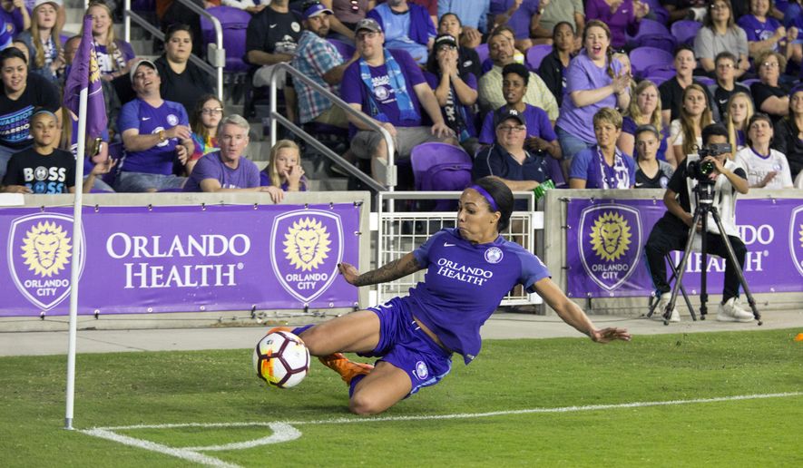 FILE - In this Saturday, March 24, 2018 file photo, Orlando Prides Sydney Leroux keeps the ball in play during a National Women&#39;s Soccer League match at Orlando City Stadium in Orlando, Fla. Sydney Leroux simply isn&#39;t done chasing her soccer dreams. The veteran forward signed a 3-year max deal with the Orlando Pride, the National Women&#39;s Soccer League team she&#39;s been with since 2018. Announced Wednesday, Feb. 3, 2021 the contract has an option for an additional year. (Justin Green/Orlando Sentinel via AP, File)