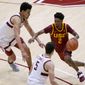 Southern California guard Tahj Eaddy (2) moves the ball between Stanford forward Spencer Jones, left, and guard Michael O&#39;Connell (5) during the second half of an NCAA college basketball game in Stanford, Calif., Tuesday, Feb. 2, 2021. Southern California won 72-66.(AP Photo/Tony Avelar)