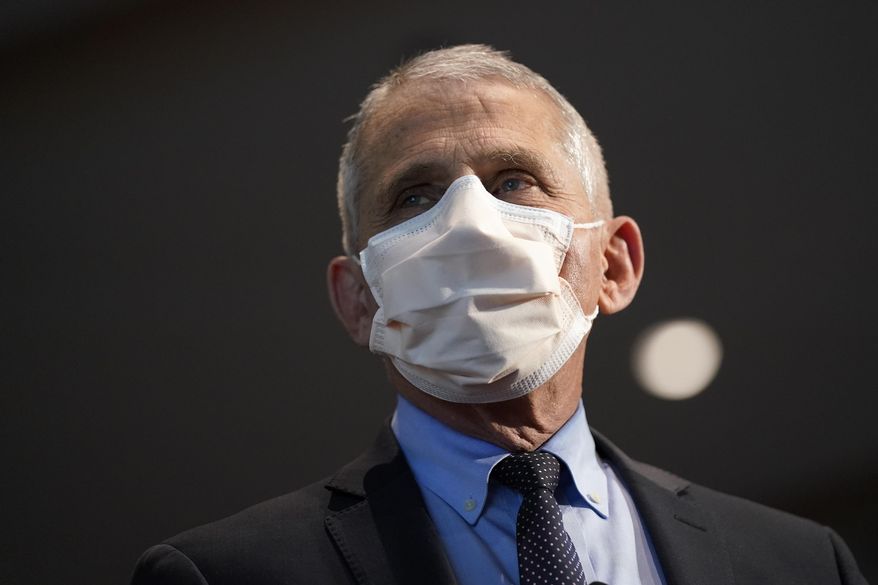 In this Dec. 22, 2020, file photo, Dr. Anthony Fauci, director of the National Institute of Allergy and Infectious Diseases, speaks before receiving his first dose of the COVID-19 vaccine at the National Institutes of Health, in Bethesda, Md.  (AP Photo/Patrick Semansky, Pool, File)