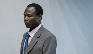 In this Tuesday, Dec. 6, 2016, file photo, Dominic Ongwen, a senior commander in the brutal Ugandan rebel group Lord&#39;s Resistance Army, whose fugitive leader Kony is one of the world&#39;s most-wanted war crimes suspects, enters the court room of the International Court in The Hague, Netherlands. Judges at the International Criminal Court are passing judgement Thursday Feb. 4, 2021, on Ongwen, who is charged with 70 crimes including murder, sexual slavery and using child soldiers. (AP Photo/Peter Dejong, File)