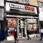 FILE - Pedestrians pass a GameStop store on 14th Street at Union Square, Thursday, Jan. 28, 2021, in the Manhattan borough of New York.  GameStop and a handful of other stocks whose meteoric rise last month shocked Wall Street began falling back to Earth this week. But the campaign that briefly pushed GameStop up by 1,600% at the expense of hedge funds that were betting it would lose value, known as “shorting,” could be a blueprint for similar efforts with other companies’ shares, some analysts say.   (AP Photo/John Minchillo, File)
