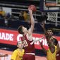 Stanford guard Noah Taitz shoots over California guard Makale Foreman during the first half of an NCAA college basketball game in Berkeley, Calif., Thursday, Feb. 4, 2021. (AP Photo/Jed Jacobsohn)