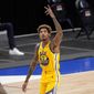 Golden State Warriors&#39; Kelly Oubre Jr. (12) celebrates a 3-point basket during the second half of the team&#39;s NBA basketball game against the Dallas Mavericks in Dallas, Thursday, Feb. 4, 2021. (AP Photo/Tony Gutierrez)