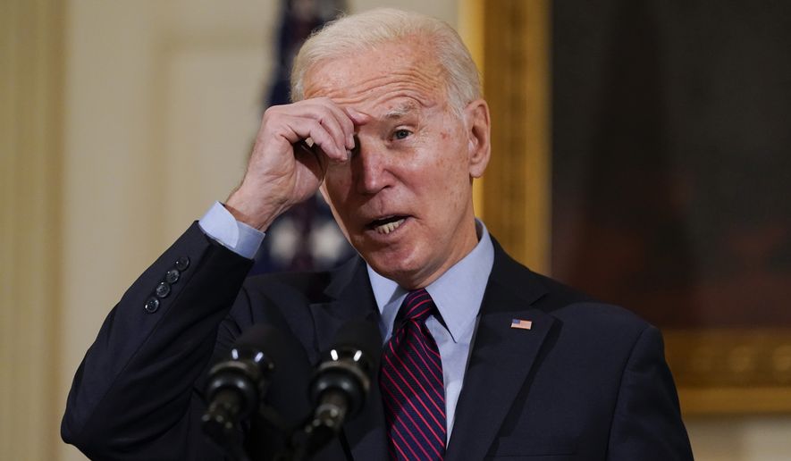 President Joe Biden speaks about the economy in the State Dinning Room of the White House, Friday, Feb. 5, 2021, in Washington. (AP Photo/Alex Brandon)