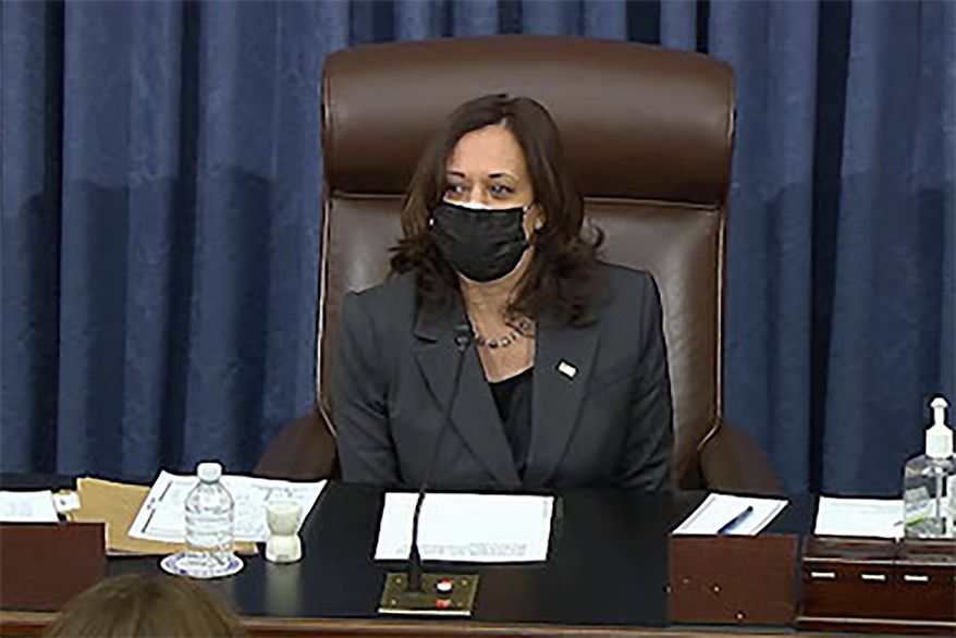 In this image from Senate TV, Vice President Kamala Harris sits in the chair on the Senate floor to cast the tie-breaking vote, her first, Friday, Feb. 5, 2021, at the Capitol in Washington. The Senate early Friday approved a budget resolution that paves the way for fast-track passage of President Joe Biden&#39;s $1.9 trillion coronavirus relief plan without support from Republicans. (Senate TV via AP)