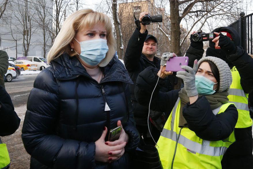 Russian opposition leader Alexey Navalny&#39;s lawyer Olga Mikhailova arrives to the Babuskinsky district court for the continuation of his trial,  in Moscow, Russia, Friday, Feb. 5, 2021. A Moscow court resumes the trial against Russian opposition leader Alexey Navalny on the charges of defamation. (AP Photo/Alexander Zemlianichenko)