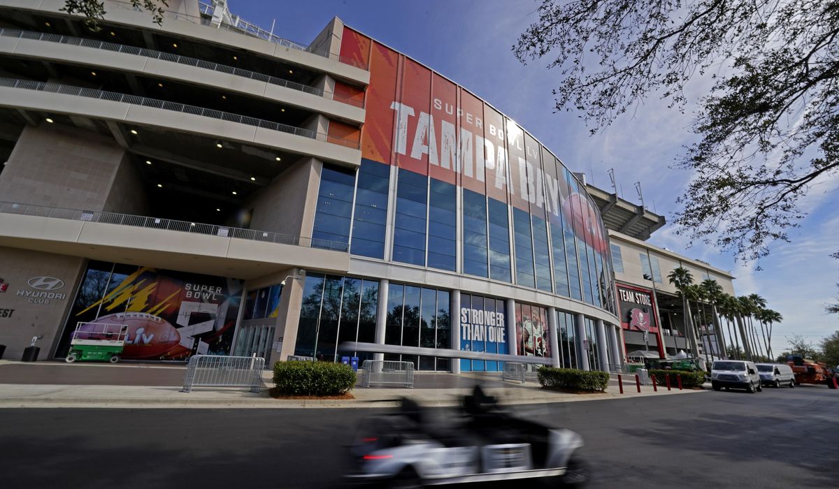 NextImg:Officers ‘arrest’ alligator walking near Tampa Bay stadium