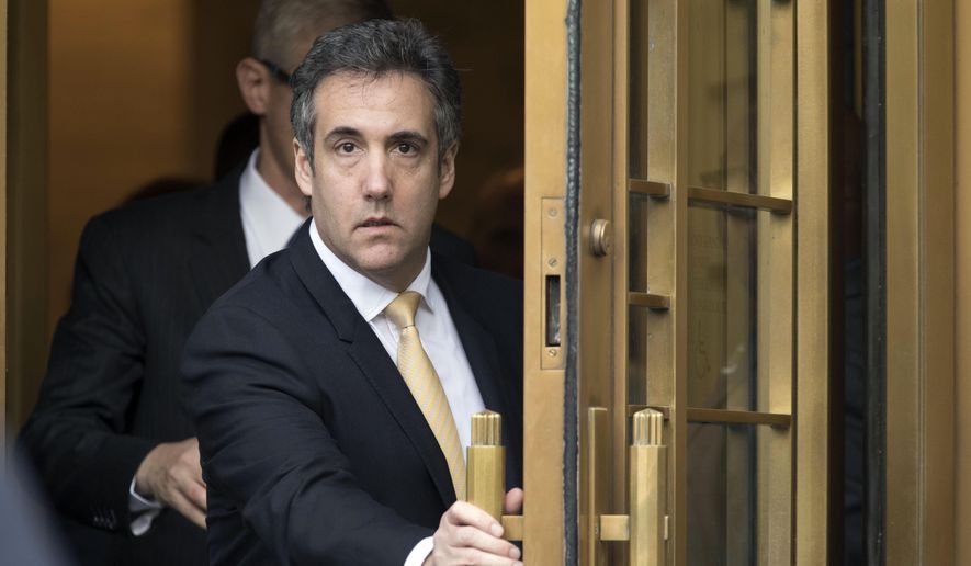 In this Aug. 21, 2018, file photo, Michael Cohen leaves federal court, in New York. (AP Photo/Mary Altaffer, File)