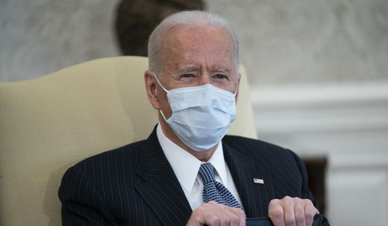 In this Feb. 3, 2021, file photo, President Joe Biden meets with Senate Majority Leader Sen. Chuck Schumer of N.Y., and other Democratic lawmakers to discuss a coronavirus relief package, in the Oval Office of the White House in Washington. (AP Photo/Evan Vucci, File)