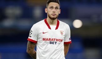 Sevilla&#39;s Lucas Ocampos reacts during the Champions League Group E soccer match between Chelsea and Sevilla at Stamford Bridge, London, England, Tuesday, Oct. 20, 2020. (AP Photo/Alastair Grant,Pool)