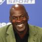 FILE - In this Jan. 24, 2020, file photo, former basketball superstar Michael Jordan speaks during a news conference ahead of an NBA basketball game between the Charlotte Hornets and the Milwaukee Bucks in Paris. The Associated Press asked eight of the greatest current and former champions, including Jordan, from seven different sports to find out what impressed them most about Tom Brady. (AP Photo/Thibault Camus, File)