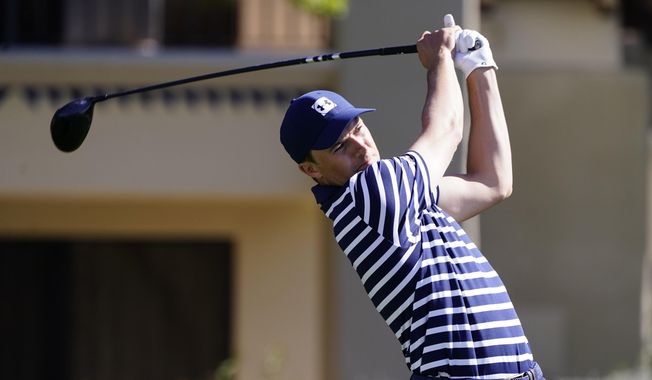 Jordan Spieth tees off on the fifth hole during the final round of a PGA golf tournament on Sunday, Feb. 7, 2021, in Scottsdale, Ariz. (AP Photo/Rick Scuteri)
