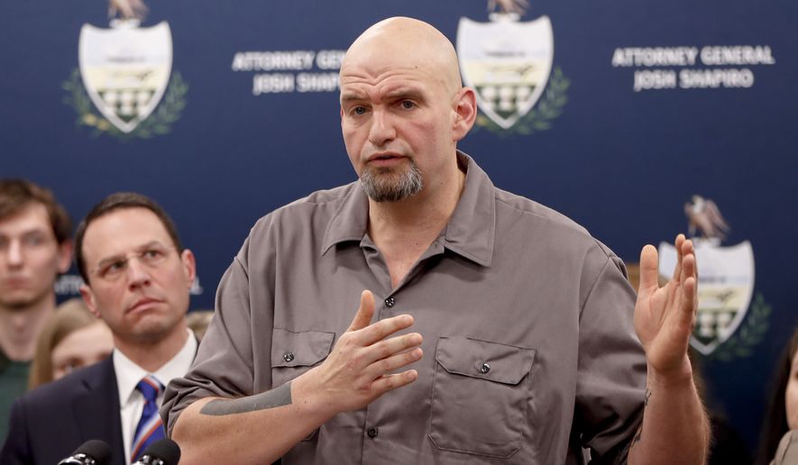 Pennsylvania Lt. Gov. John Fetterman, right, speaks as he stands beside state Attorney General Josh Shapiro during a news conference about legal action in the dispute between health insurance providers UPMC and Highmark, Thursday, Feb. 7, 2019, in Pittsburgh. Fetterman will run for U.S. Senate, making the announcement Monday, Feb. 8, 2021, after kicking off an exploratory fundraising campaign last month that raised over $1 million. (AP Photo/Keith Srakocic)