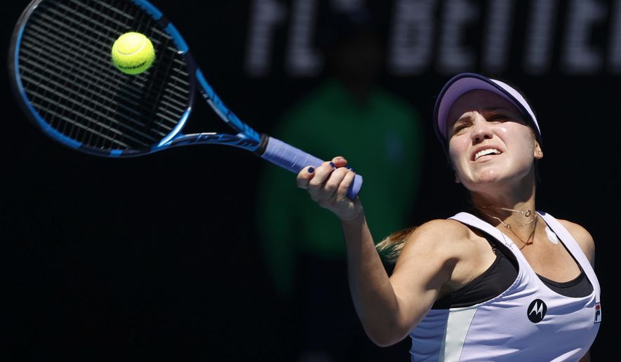 United States' Sofia Kenin makes a forehand return to Australia's Maddison Inglis during their first round match at the Australian Open tennis championship in Melbourne, Australia, Tuesday, Feb. 9, 2021.(AP Photo/Rick Rycroft)