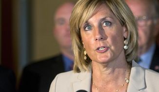 FILE - In this June 10, 2015 file photo, assemblywoman Claudia Tenney, R-New Hartford, speaks during a news conference at the Capitol, in Albany, N.Y. A New York judge ruled Friday that Republican Claudia Tenney defeated US Rep. Anthony Brindisi by 109 votes in last open race. (AP Photo/Mike Groll, File)