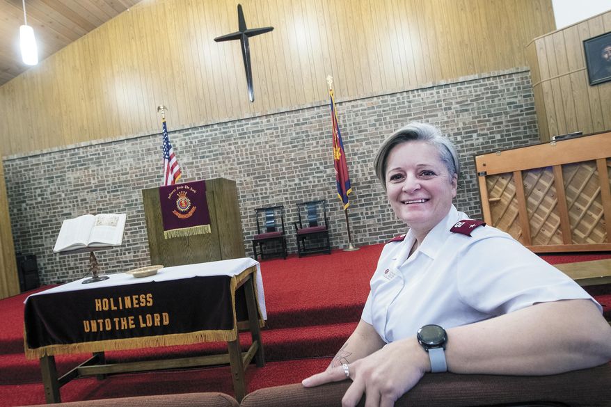 Lt. Shannon Brown, the new Corps Officer at the Hobbs Salvation Army, poses for a photo in the chapel at the Hobbs Salvation Army, Friday, Jan. 22, 2021, in Hobbs, N.M. Brown knows the struggles of homelessness and addiction. That’s one of the reasons the new corps officer for the Hobbs Salvation Army wants to turn the former Thrift Store on Main Street in Hobbs into a shelter for the area’s homeless. (Andy Brosig/The Hobbs Daily News-Sun via AP)