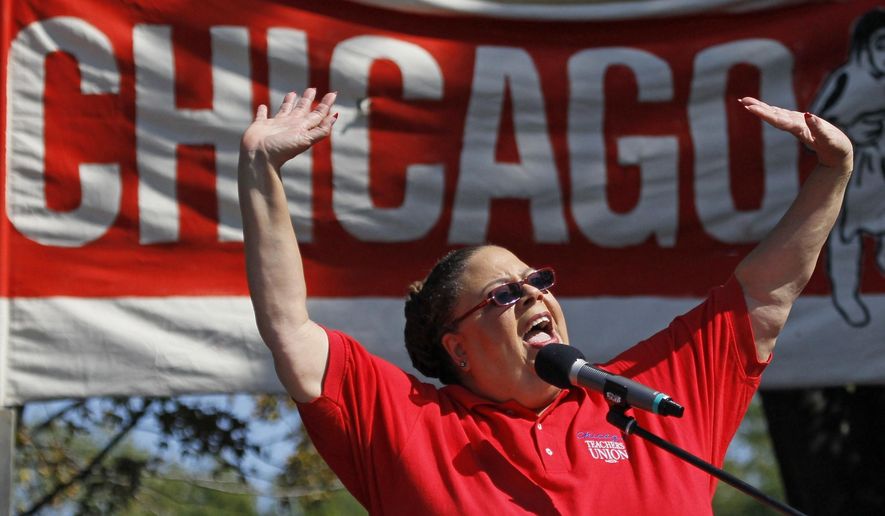 FILE - In this Sept. 15, 2012, file photo, Karen Lewis, president of the Chicago Teachers Union addresses the crowd during a rally in Chicago. Lewis, the former Chicago Teachers Union president and onetime mayoral hopeful, has died at 67, a spokeswoman said Monday, Feb. 8, 2021. (AP Photo/Charles Rex Arbogast, File)