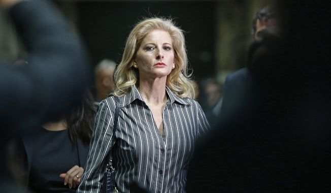 In this Dec. 5, 2017, file photo, Summer Zervos leaves Manhattan Supreme Court at the conclusion of a hearing in New York. The former &quot;Apprentice&quot; contestant is trying to get her defamation lawsuit against former President Donald Trump moving again now that he&#x27;s no longer president. (AP Photo/Kathy Willens, File)