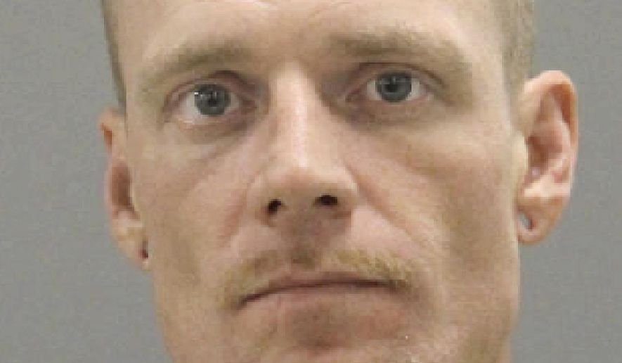 This booking photo taken Friday, Jan. 3, 2019, and provided by the Rockford, Ill., Police Department shows Nicholas August, 39, who was sentenced to 30 years in prison for sexually assaulting a woman he took hostage at gunpoint last year during a bank robbery that led to a police standoff. August was sentenced Friday after pleading guilty to two counts of aggravated criminal sexual assault with a weapon. (Rockford Police Department via AP)