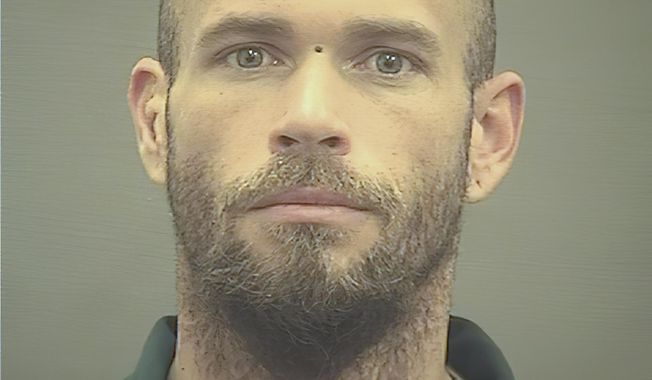 This image provided by The Alexandria (Va.) Sheriff&#x27;s Office shows Jacob Chansley. A judge ordered corrections authorities to provide organic food to the Arizona man who is accused of participating in the insurrection at the U.S. Capitol while sporting face paint, no shirt and a furry hat with horns. He was moved from the Washington jail to the Virginia facility. (Alexandria Sheriff&#x27;s Office via AP)